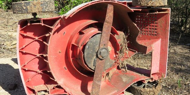 the underside of a lawnmower