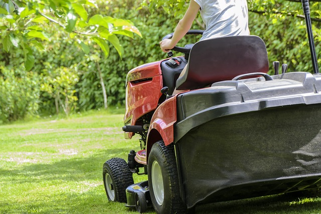 A person attaching an accessory to a Craftsman lawn mower